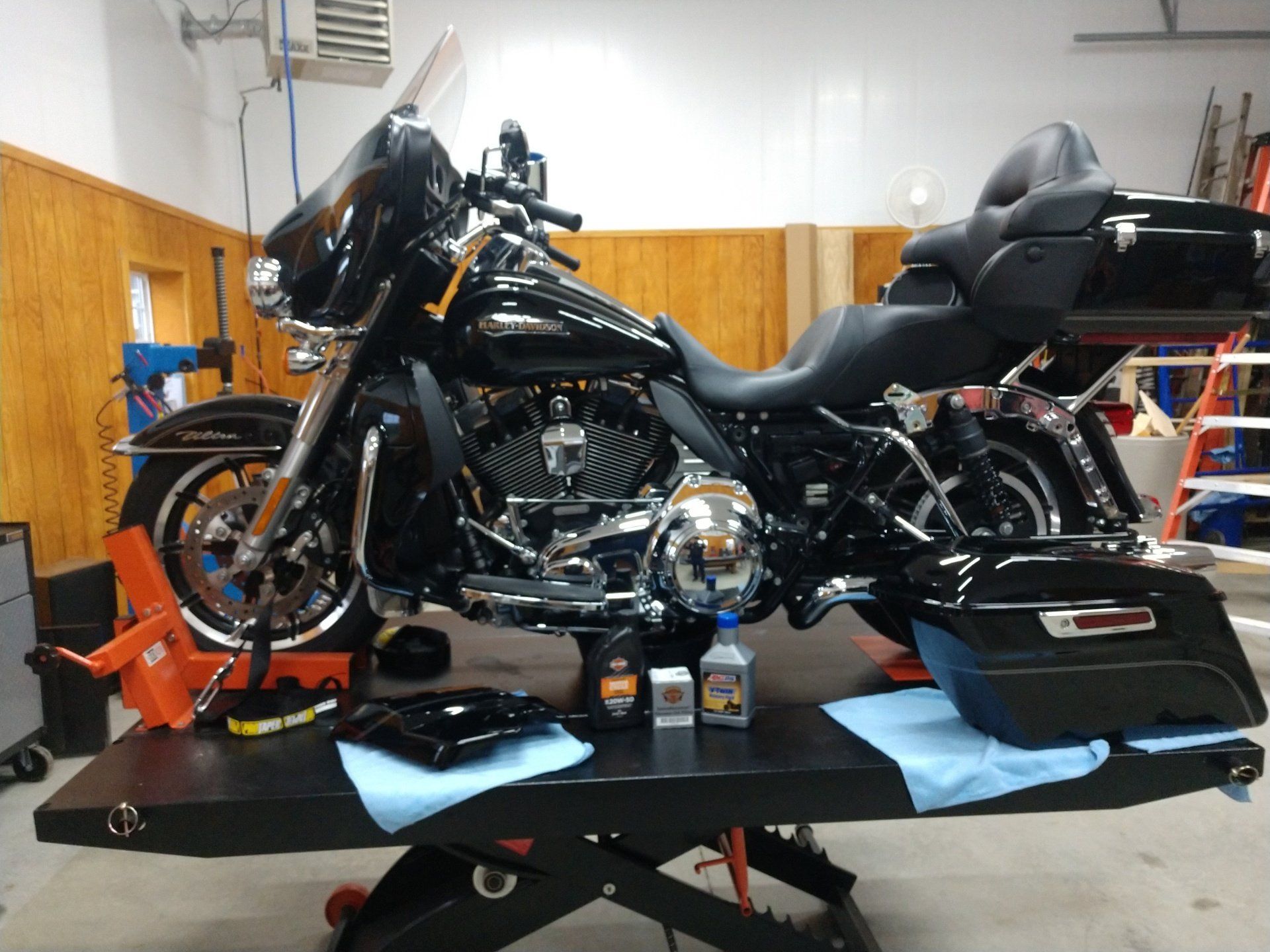 Motorcycle being serviced in the County Line Cycles shop